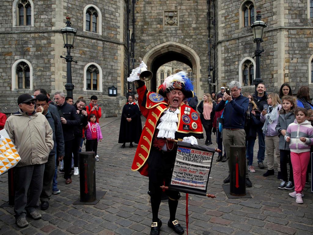 Town crier Tony Appleton announces the birth outside Windsor Castle, west of London. Picture: Adrian Dennis / AFP