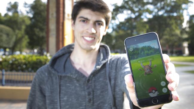 Jarrod Douglas, 20, from Holsworthy hasn’t put his phone down since Pokemon Go was released last Wednesday. Picture: Melvyn Knipe