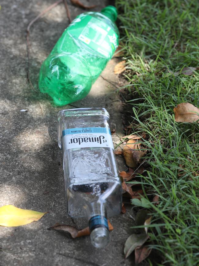 An empty vodka bottle in the street. Picture: Glenn Hampson.