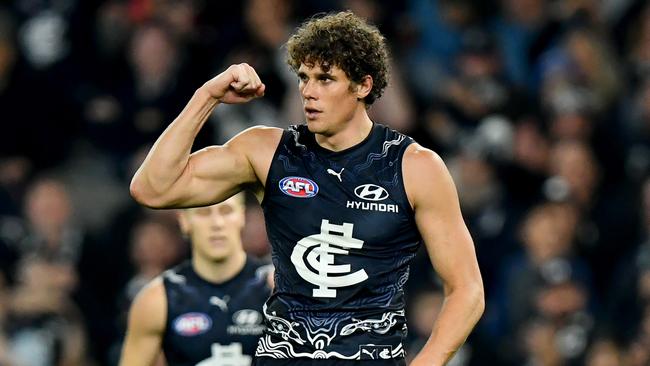 MELBOURNE, AUSTRALIA – MAY 25: Charlie Curnow of the Blues celebrates kicking a goal during the round 11 AFL match between Carlton Blues and Gold Coast Suns at Marvel Stadium, on May 25, 2024, in Melbourne, Australia. (Photo by Josh Chadwick/AFL Photos/via Getty Images)