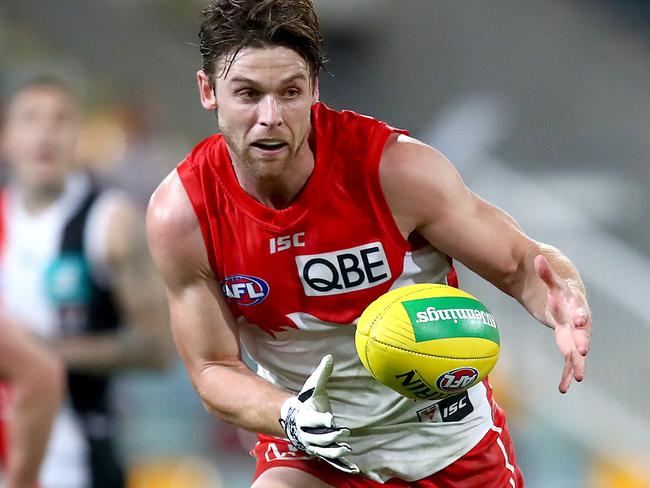 BRISBANE, AUSTRALIA - AUGUST 01: Dane Rampe of the Swans controls the ball during the round nine AFL match between St Kilda Saints and the Sydney Swans at The Gabba on August 01, 2020 in Brisbane, Australia. (Photo by Jono Searle/AFL Photos/via Getty Images)