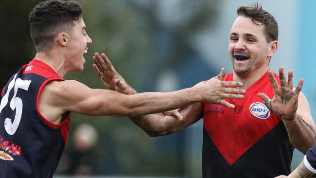 St Albans star Tim Jenkins (right) celebrates a goal in the WRFL. Picture: Local Legends Photography