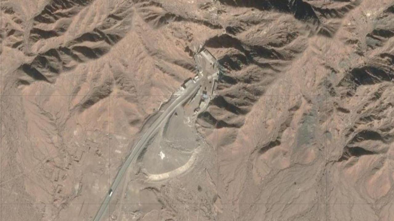 Three old nuclear testing tunnel in Xinjiang are showing signs of being reactivated, with extensive construction works in progress. Picture: Google Earth / Maxar