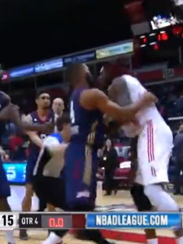 Montrezl Harrell pushes NBA referee Jason Goldenberg.