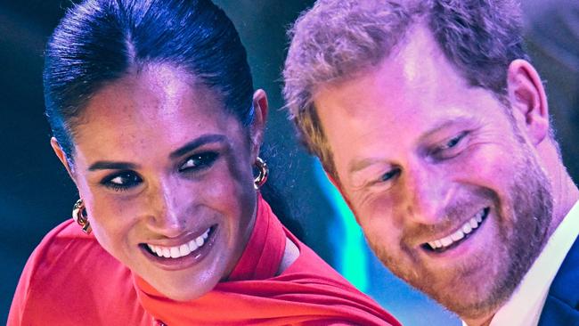 (FILES) Britain's Meghan, Duchess of Sussex (L) and Britain's Prince Harry, Duke of Sussex, attend the annual One Young World Summit at Bridgewater Hall in Manchester, north-west England on September 5, 2022. Prince Harry and wife Meghan Markle were involved in a "near catastrophic car chase" involving paparazzi in New York late on May 16, 2023, a spokesperson for the couple said May 17. "This relentless pursuit, lasting over two hours, resulted in multiple near collisions involving other drivers on the road, pedestrians and two NYPD officers," the spokesperson added. (Photo by Oli SCARFF / AFP)