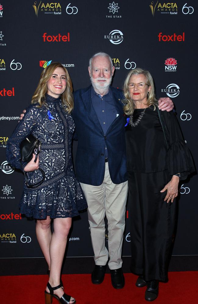 David Stratton, centre, with director Gillian Armstrong (right) at the AACTA Awards in 2018. Picture: Getty Images