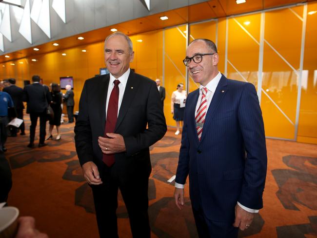 19/12/2018 NAB Chairman Ken Henry and CEO Andrew Thorburn chat with shareholders before the AGM at Melbourne Convention Centre.Picture : David Geraghty / The Australian.