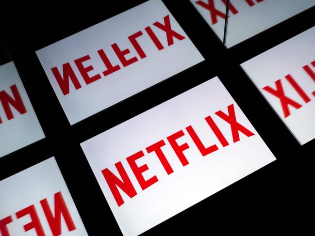 (FILES) In this file photo taken on February 18, 2019 This illustration picture shows the US Online Streaming giant Netflix logo displayed on a tablet in Paris. - It may already have Oscars under its belt, but Netflix's acceptance by the Academy of Motion Picture Arts and Sciences hangs in the balance. The prestigious body is set to reexamine whether the streaming giant will remain eligible for such awards, despite a warning from the US Justice Department that could violate antitrust laws. (Photo by Lionel BONAVENTURE / AFP)