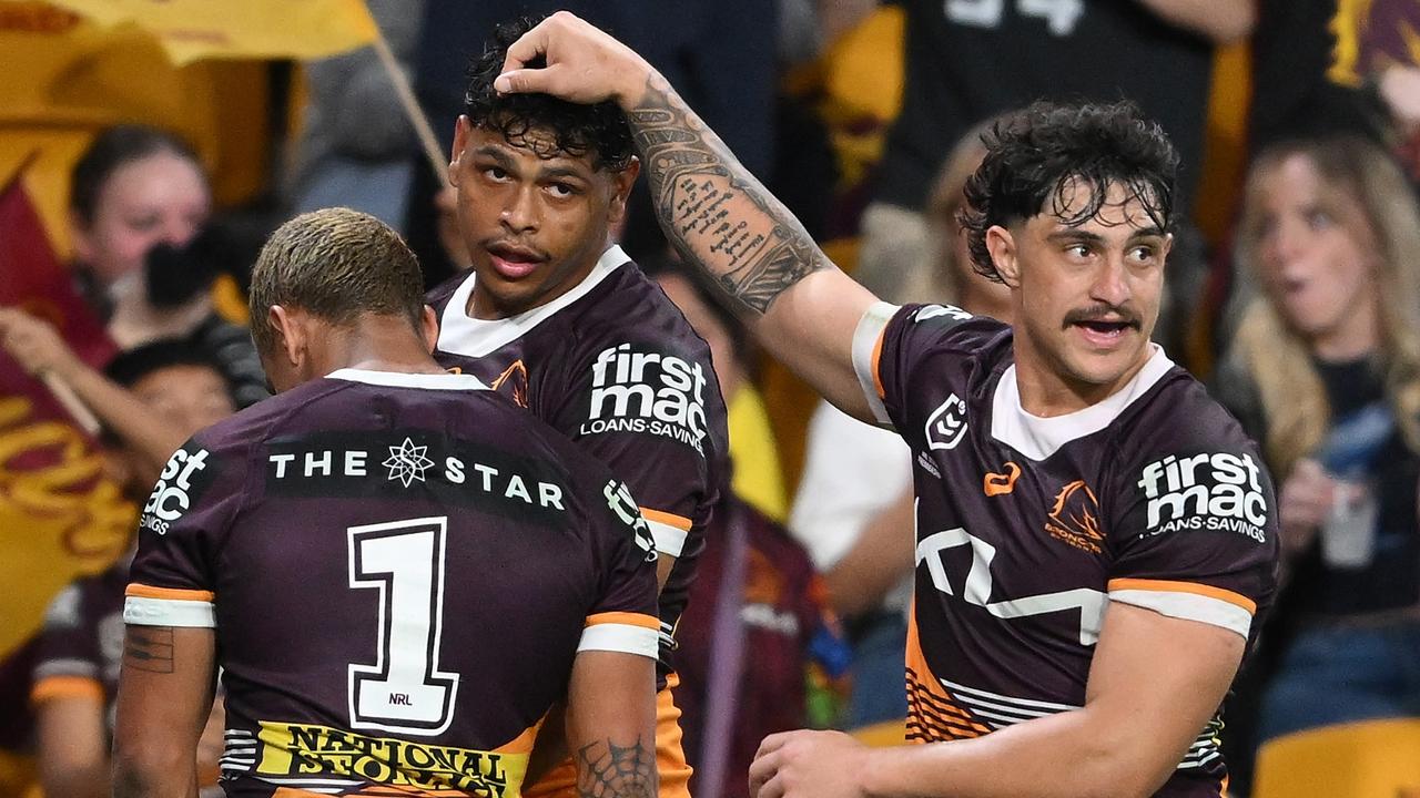 BRISBANE, AUSTRALIA - AUGUST 23: Selwyn Cobbo of the Broncos celebrates scoring a try with team mates during the round 25 NRL match between Brisbane Broncos and Parramatta Eels at Suncorp Stadium, on August 23, 2024, in Brisbane, Australia. (Photo by Matt Roberts/Getty Images)