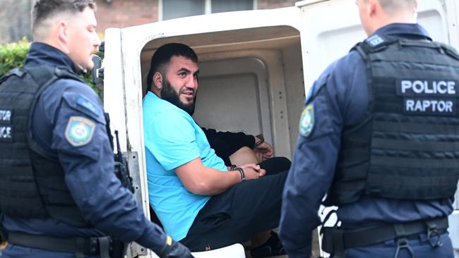 Elmoubayed during his arrest by Raptor Squad officers. Picture: Jeremy Piper