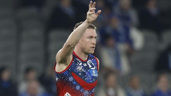 Tom McDonald signals to the bench last week after hurting an ankle. Picture: Getty Images