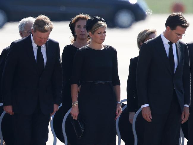 King Willem-Alexander (L) of the Netherlands stands with Queen Maxima (centre) of the Netherlands and Dutch Prime Minister Mark Rutte (R). Picture: Peter Macdiarmid