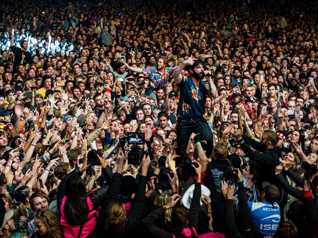 Foals front man Yannis Philippakis ventures out into the crowd during the band's set at Splendour in the Grass 2019. Supplied by SITG PR.