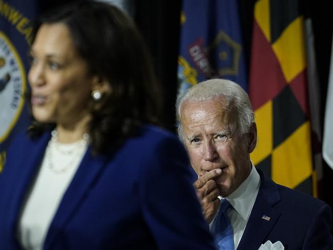 Joe Biden looks on as Kamala Harris speaks. Picture; AFP.