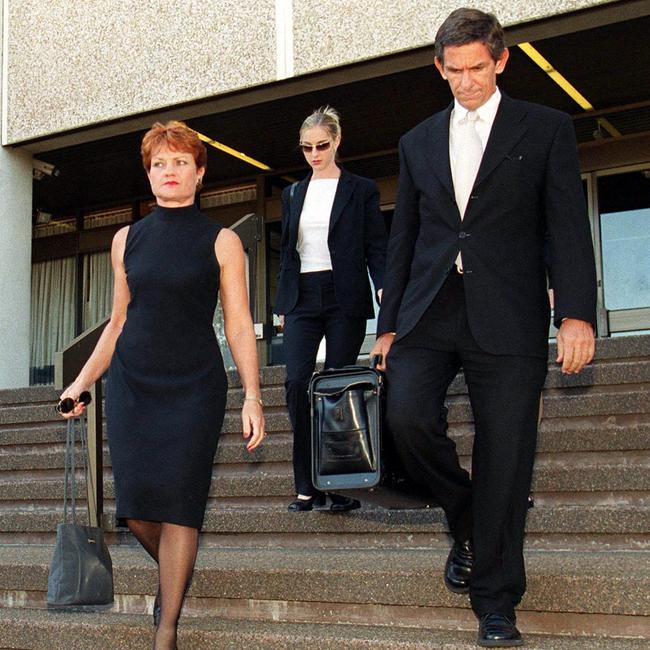 Pauline Hanson leaves the Magistrates' Court with daughter Lee Hanson (rear) and lawyer Chris Nyst (right).