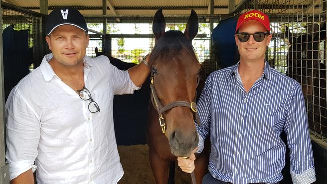 Brian Seimsen and Harry McAlpine with their American Pharoah colt, which is scheduled to be sold on Thursday.