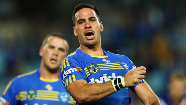 Parramatta's Corey Norman celebrates after scoring a try. Pic Brett Costello