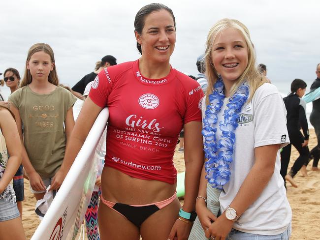 Australia's Tyler Wright with a fan at manly on Sunday. Pic: Brett Costello