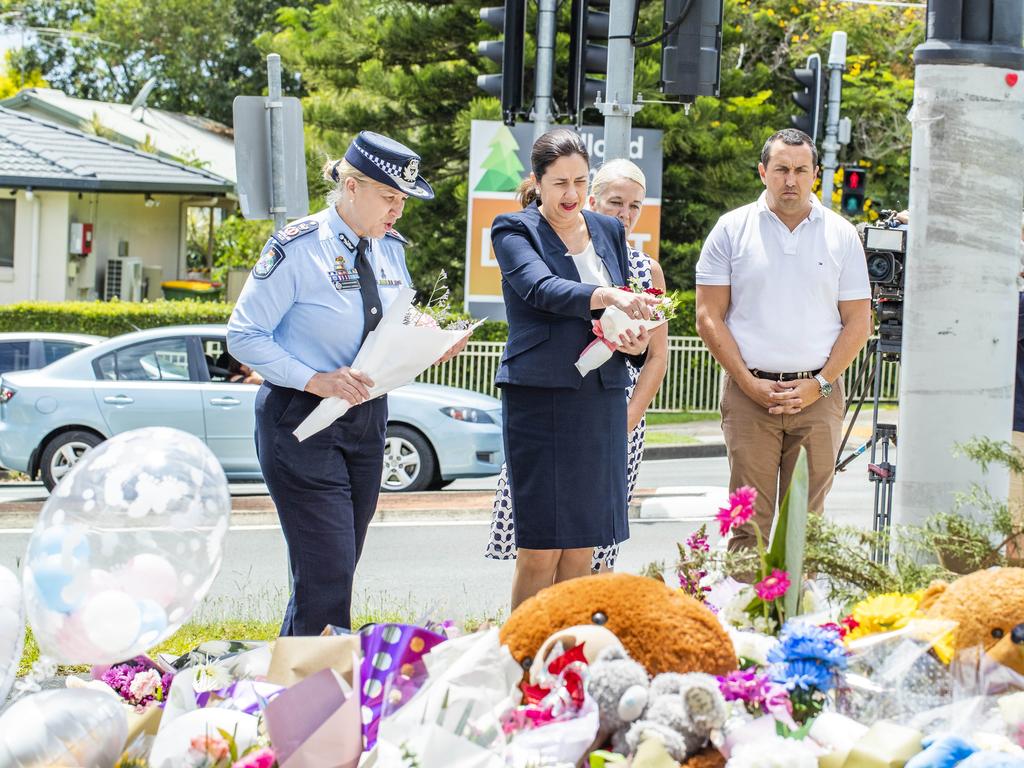 Premier Annastacia Palaszczuk and Police Commissioner Katarina Carroll lay flowers for Kate Leadbetter and Matty Field at the intersection of Vienna and Finucane roads. Picture: Richard Walker