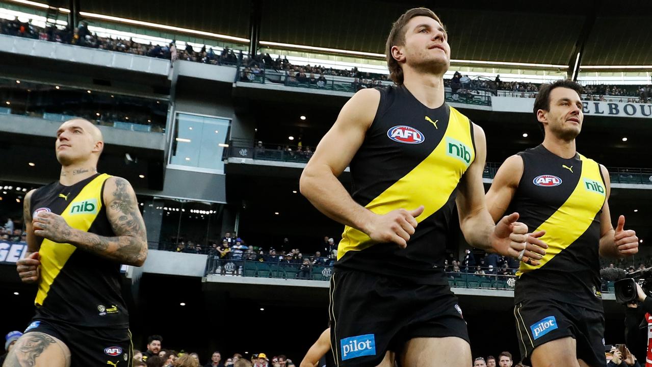 Liam Baker (middle) will continue to be a Tiger after re-signing for two years. Picture: Getty Images