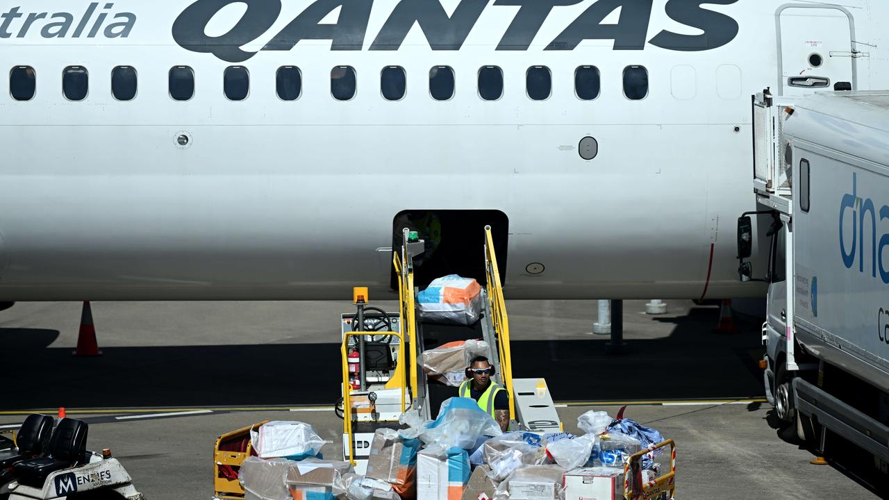Baggage handlers at work on a Qantas aircraft at Brisbane Airport. Picture: NCA NewsWire/Dan Peled