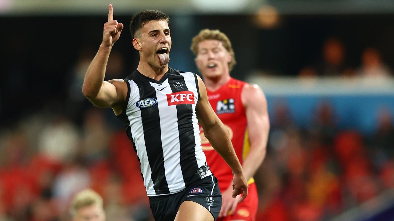 GOLD COAST, AUSTRALIA - JUNE 29: Nick Daicos of the Magpies celebrates a goal during the round 16 AFL match between Gold Coast Suns and Collingwood Magpies at People First Stadium, on June 29, 2024, in Gold Coast, Australia. (Photo by Chris Hyde/Getty Images)