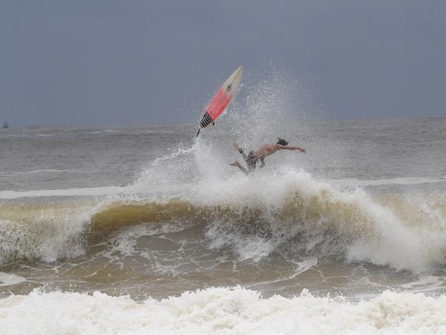 High tides and rainfall have created rough conditions aloung the Sunshine Coast coastline.Surfers enjoy the conditions at Mooloolaba.Jake Edgar,17, of Mountain Creek gets some air.