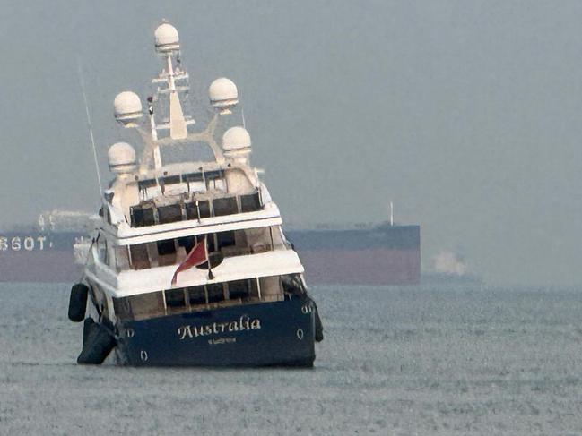 Clive Palmer's superyacht Australia runs aground off Singapore on Monday.