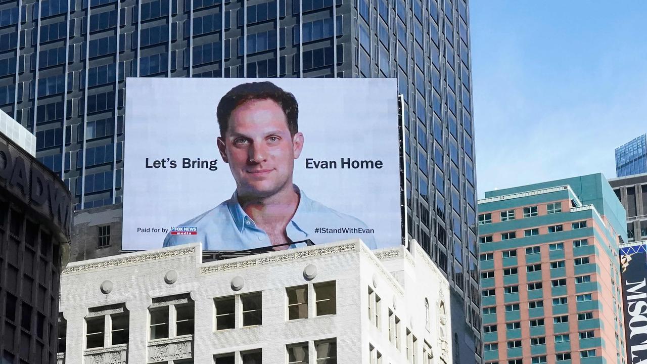 An electronic billboard at New York's Times Square marks the one year anniversary of the imprisonment in Russia of Wall Street Journal reporter Evan Gershkovich, on March 29, 2024. (Photo by TIMOTHY A. CLARY / AFP)