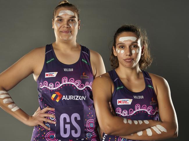 Firebirds Indigenous players Donnell Wallam (left) and Jemma Mi Mi model the club's First Nations dress. Photo: Queensland Firebirds