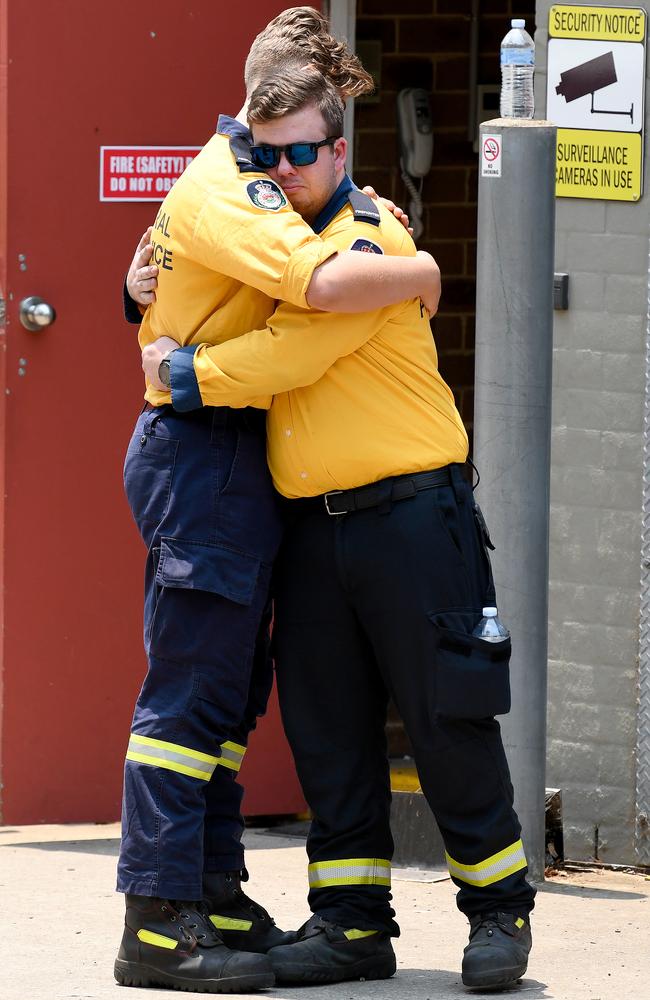 Members of the Horsley Park RFS at a memorial for their two fellow volunteers. Picture: Bianca De Marchi/AAP