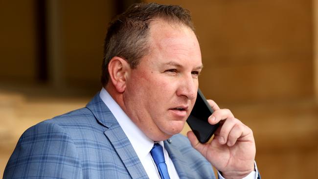 Horse trainer Christopher Bieg outside the District Court, where he is on trial charged with serious domestic violence offences. Picture: NCA NewsWire / Kelly Barnes