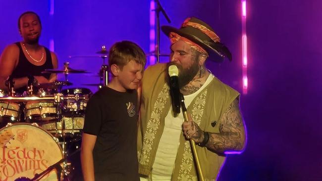 Teddy Swims interacting with young fan during his concert at Brisbane's Riverstage on July 9, 2024. Photo: Facebook.