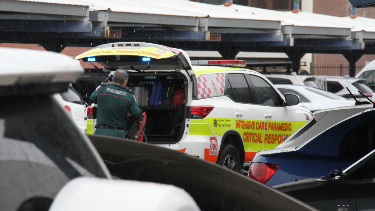 A paramedic outside Coles in Alice Springs. A man has died inside Alice Springs Coles on May 27, 2025, with police saying he was in custody at the time. Picture: Gera Kazakov