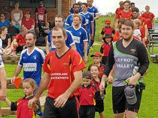 STRONG CULTURE: Gatton Redbacks captain and club president Adam Halstead leads the premier men's team for their opening game of the season. Halstead believes the club's strong and positive culture is the reason behind their continued growth. Picture: Contributed