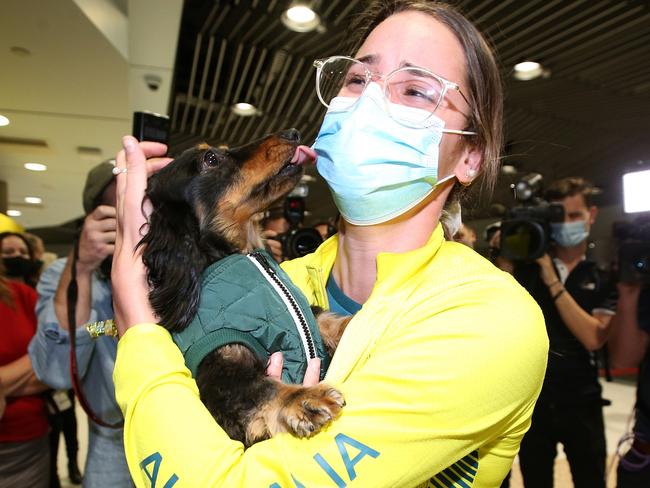 Heartwarming scenes as Olympians return home