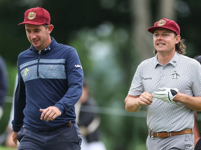 LOUISVILLE, KENTUCKY - MAY 14: Lucas Herbert of Australia and Cameron Smith of Australia walks the tenth fairway during a practice round prior to the 2024 PGA Championship at Valhalla Golf Club on May 14, 2024 in Louisville, Kentucky.   Christian Petersen/Getty Images/AFP (Photo by Christian Petersen / GETTY IMAGES NORTH AMERICA / Getty Images via AFP)