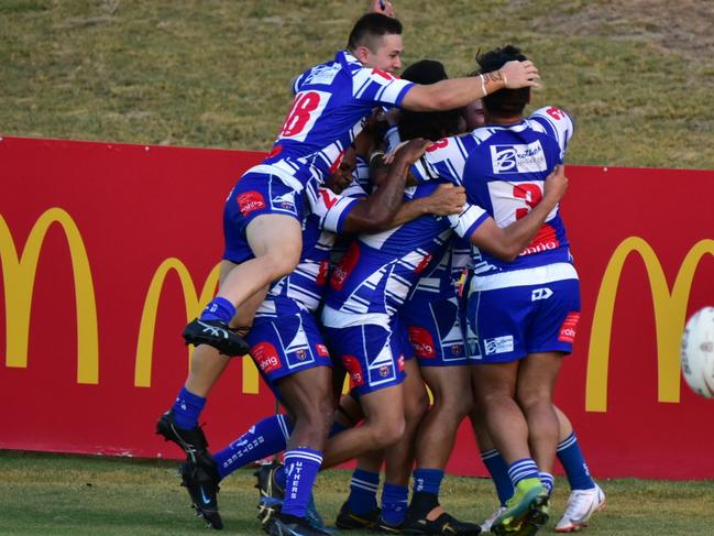 Brothers players celebrate their nailbiting extra-time preliminary final victory over the Jets at the North Ipswich Reserve. Picture: Bruce Clayton