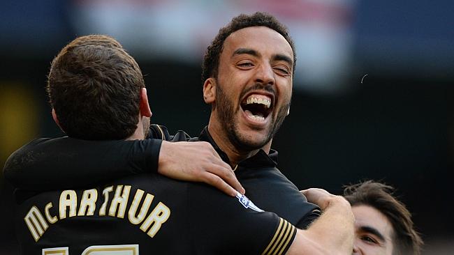 Wigan‘s James Perch celebrates scoring his team's second goal.