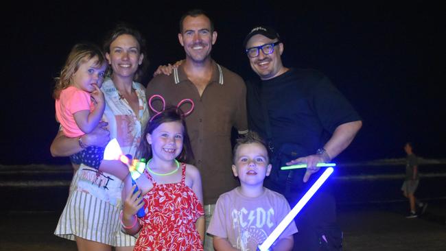 James Gately, Frank Hegerty, Lucy Hegerty and Jack, Charlie and Scarlett celebrating New Year's Eve 2022 at Mooloolaba. Photo: Elizabeth Neil