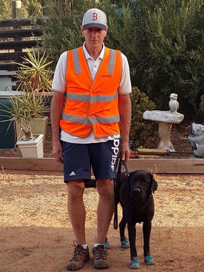 Raymond Meadows and his guide dog Gerry.