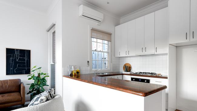 The kitchen has granite benches stainless-steel cooking appliances and a dishwasher. Picture: Supplied/Christopher Alexander