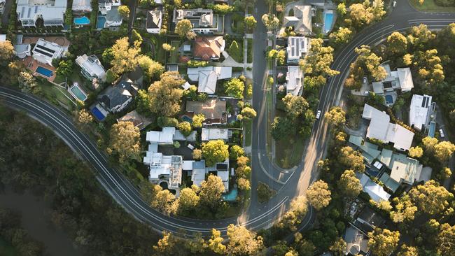 OECD warns Australia’s debt-riddled households would suffer from a US-China trade war.