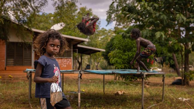 Local children play outside the classroom. Picture: Rebecca Parker