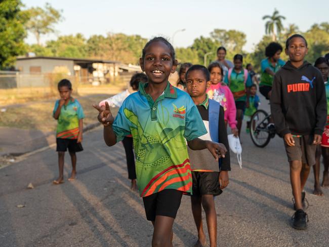 Ludmilla Primary School's attendance and engagement has increased thanks to a partnership with the Bagot Community walking school bus program. Picture: Pema Tamang Pakhrin