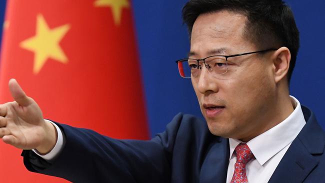 Chinese Foreign Ministry spokesman Zhao Lijian speaks to reporters. Picture: AFP.