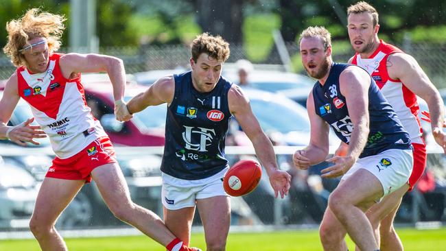 WINNER: Launceston's Jobi Harper (middle) competes with for the ball against Clarence's Ethan Jackson (left) in the Round 12 TSL game between Clarence v Launceston from Richmond Oval. Despite a quiet game against the Roos, Harper will at worst share the player of the year award. Picture: Solstice Digital