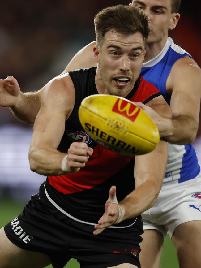 Zach Merrett fires out a handpass on Thursday night. Picture: Michael Klein