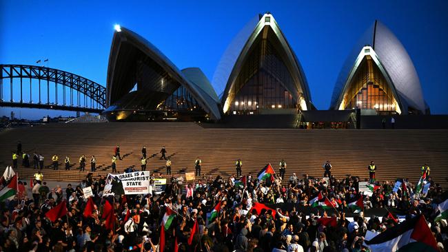 Participants of a Free Palestine rally react outside Sydney Opera House in Sydney. Picture: AAP