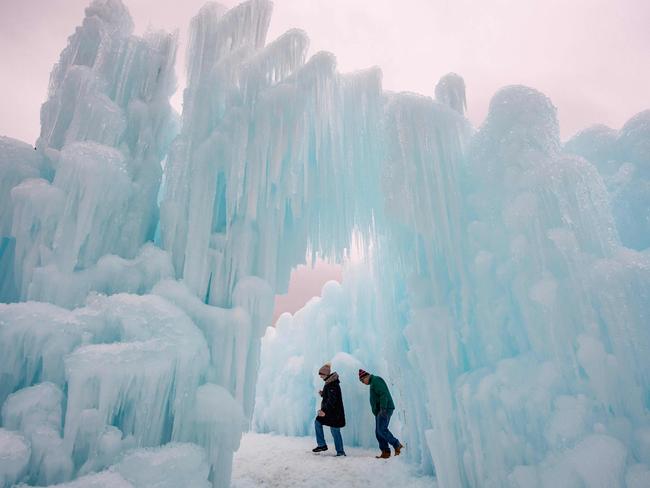 Visitors marvel at the icy formations at Ice Castles in New Hampshire, USA. Picture: Joseph Prezioso/AFP